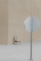 sign and chair